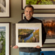 Photographer Craig Blacklock with a copy of his published book